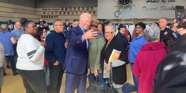 Former Vice President Joe Biden visits a caucus precinct in Henderson, Nevada, on Feb. 22, 2020