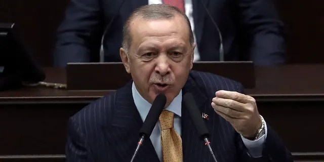 Turkey's President Recep Tayyip Erdogan said he had not looked at the drawing and had nothing to say about the “dishonorable” publication. (AP Photo)