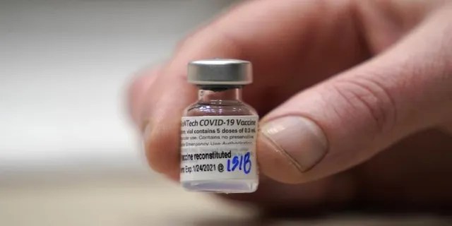 This photo shows a vial of the Pfizer vaccine for COVID-19 in Seattle. (AP Photo/Ted S. Warren, File)