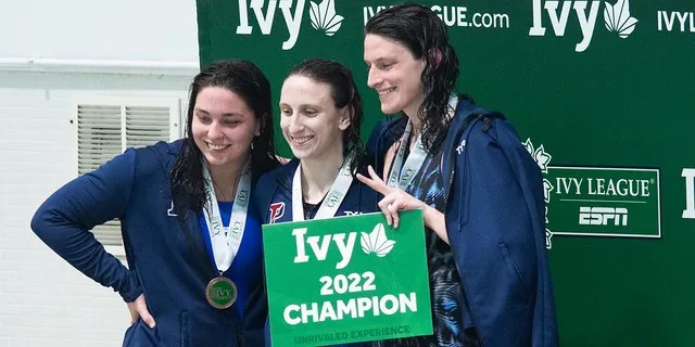 University of Pennsylvania swimmer Lia Thomas smiles on the podium after winning the 500 freestyle during the 2022 Ivy League Womens Swimming and Diving Championships at Blodgett Pool on Feb. 17, 2022, in Cambridge, Massachusetts.
