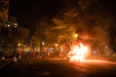 Protesters set a fire in the street a block from the White House while protesting the death of George Floyd at the hands of Minneapolis Police in Washington, D.C. (Photo credit: SAMUEL CORUM/AFP via Getty Images)