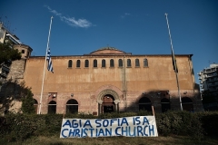 A banner in front of a Greek Orthodox Church in the Greek city of Thessaloniki on Friday. (Photo by Sakis Mitrolidis/AFP via Getty Images)