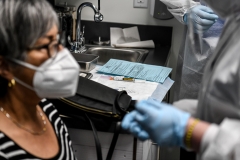 A COVID-19 vaccine is ready to be given to a volunteer at the Research Centers of America (RCA) in Hollywood, Fla. (Photo credit: CHANDAN KHANNA/AFP via Getty Images)
