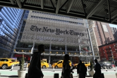 Featured is the outside of a New York Times bureau. (Photo credit: Gary Hershorn/Corbis via Getty Images)