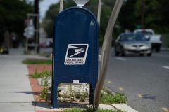 A United States Postal Service (USPS) mailbox stands in front of a post office in Washington, D.C., on Aug. 18, 2020. (Photo credit: NICHOLAS KAMM/AFP via Getty Images)