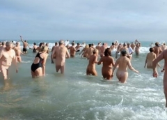 Nudists take part in a traditional end-of-year swim at the resort near Cap d’Agde in southern France. (Photo by Pascal Guyot/AFP via Getty Images)