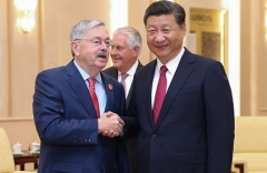 U.S. Ambassador Terry Branstad and Chinese President Xi Jinping in Beijing in 2017. (Photo by Lintao Zhang/AFP via Getty Images)
