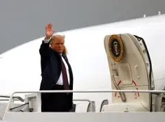 President Donald Trump ewaves as he boards Air Force One at Joint Base Andrews in Maryland on September 11, 2020. - President Trump travels to Shanksville, Pennsylvania, to attend the 19th anniversary commemoration for the 9/11 attacks. (Photo by ANDREW CABALLERO-REYNOLDS/AFP via Getty Images)