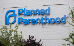 Featured is the logo outside a Planned Parenthood facility. (Photo credit: SAUL LOEB/AFP via Getty Images)