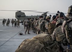 U.S. special forces soldiers prepare to board CH-47 Chinook helicopters in Afghanistan's Helmand province. (Photo: (U.S. Army/Sgt. Connor Mendez)
