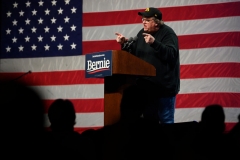 US filmmaker-author-activist Michael Moore, speaks to supporters of Democratic presidential candidate Senator Bernie Sanders at a campaign event in Clive, Iowa, on January 31, 2020. (Photo by JIM WATSON/AFP via Getty Images)