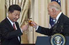 Vice President Joe Biden toasts Chinese President Xi Jinping in 2015. (Photo by Paul J. Richards/AFP via Getty Images)