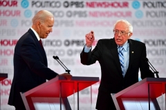 Joe Biden and Bernie Sanders at one of the Democrat primary debate s. (Photo by FREDERIC J. BROWN/AFP via Getty Images)