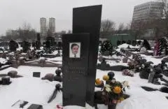 Sergei Magnitsky’s grave in Moscow’s Preobrazhenskoye cemetery. (Photo by Andrey Smirnov/AFP via Getty Images)