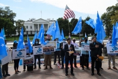 Uyghurs hold a rally near the White House in October. (Photo by Nicholas Kamm/AFP via Getty Images)