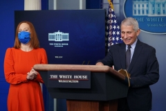Director of the National Institute of Allergy and Infectious Diseases Anthony Fauci smiles as White House Press Secretary Jen Psaki (L) speaks to reporters during the daily briefing in the Brady Briefing Room of the White House in Washington, DC on January 21, 2021. (Photo by MANDEL NGAN/AFP via Getty Images)