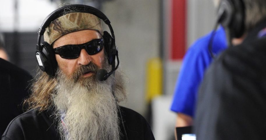 Reality TV star Phil Robertson talks with Steve Bannon on Breitbart News Daily on SiriusXM Patriot at the Quicken Loans Arena on July 21, 2016, in Cleveland.