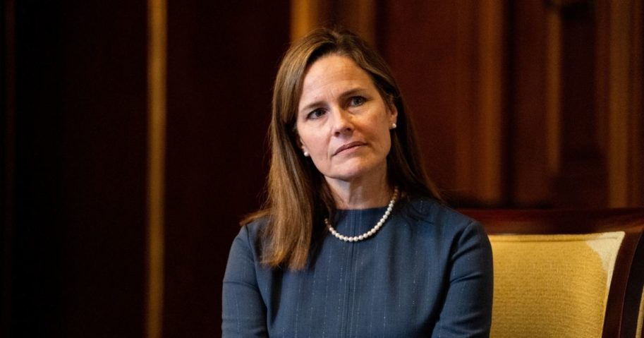 Judge Amy Coney Barrett, President Donald Trump's nominee for the U.S. Supreme Court, meets with Republican Sen. Rick Scott of Florida as she begins a series of meetings to prepare for her confirmation hearing at the U.S. Capitol in Washington, D.C., on Tuesday.